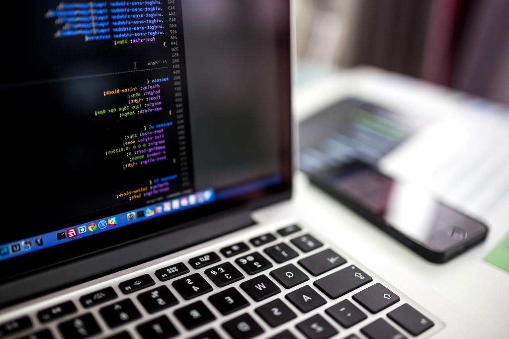 Laptop with code and technology blog